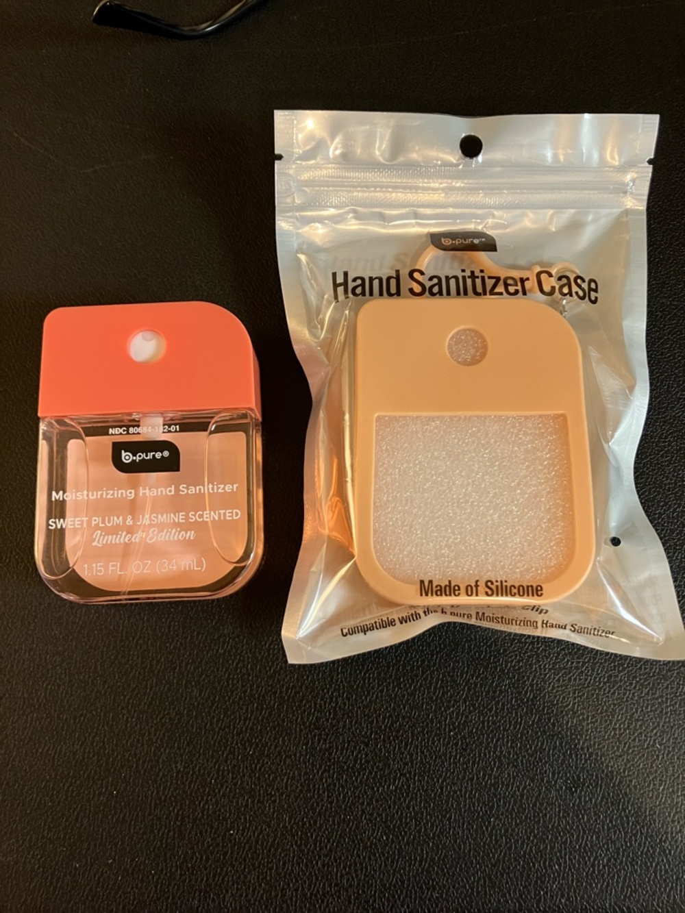 b-pure Moisturizing Hand Sanitizer Sweet Plum & Jasmine with 
Silicone Case.